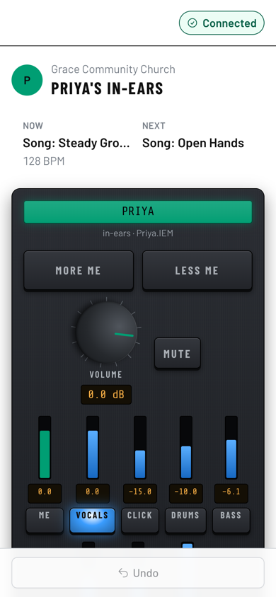 A phone showing Priya's in-ears: the current and next song, More me and Less me buttons, a volume knob, and sliders for me, vocals, click, drums and bass.
